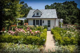 cottage-and-manicured-rose-garden
